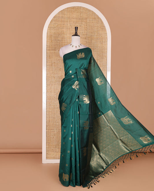 Borderless green floral and elephant buttas zari woven kanchi silk saree, intricate pallu, and matching zari design blouse