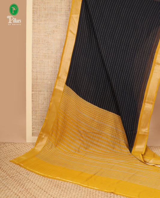 Black gold foil printed moss crepe saree with contrast gold zari thread border & printed lining chit pallu along with plain blouse