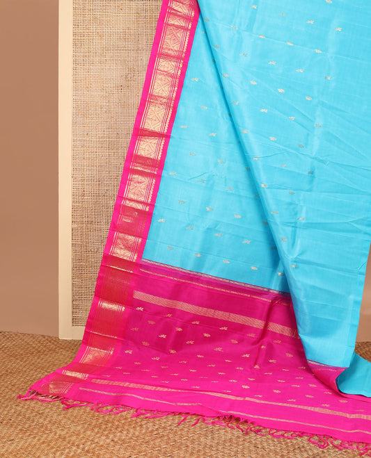 Light blue buttas kancheepuram silk saree with contrast korvai intricate zari design border & floral design pallu