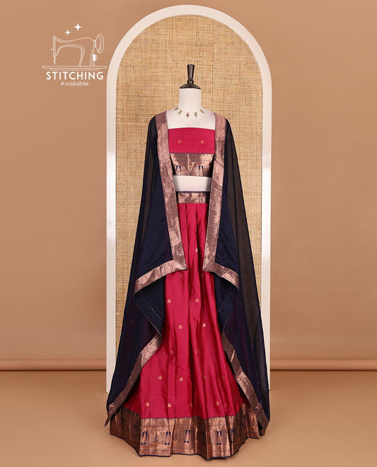Pink taffeta silk half saree, zari buttas with contrast blue traditional zari border, matching zari blouse, and contrast plain zari border dhavani