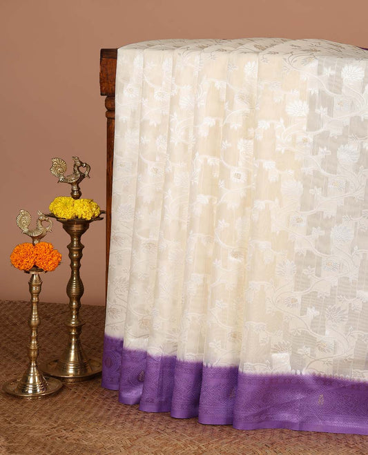 Cream with violet thread weaving, zari butta banaras brasso saree with contrast thread border & thread weaving pallu along with butta design blouse