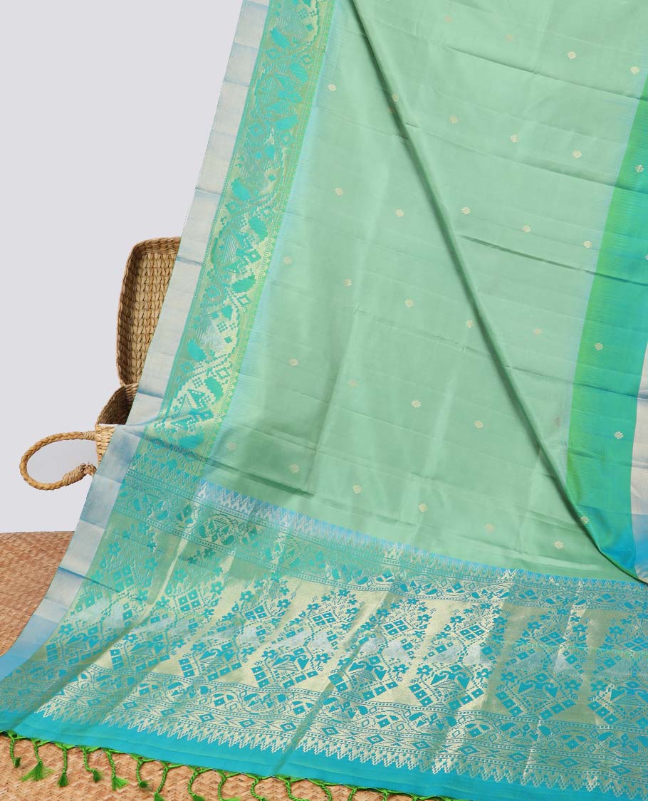 Green floral buttas soft silk saee with contrast ikkat zari border & floral zari design pallu