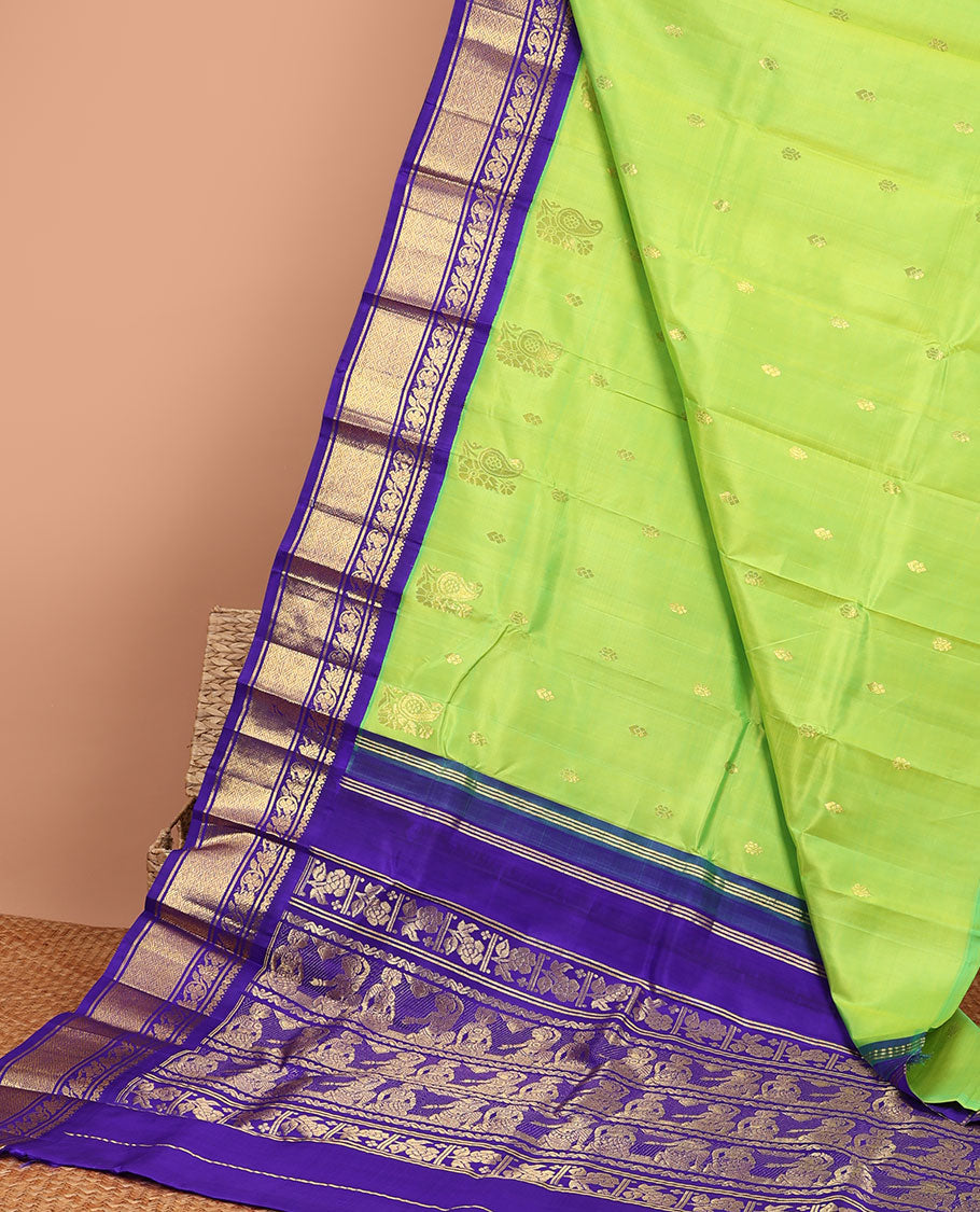 Green floral buttas kancheepuram silk saree with contrast intricate zari border & floral, human design pallu