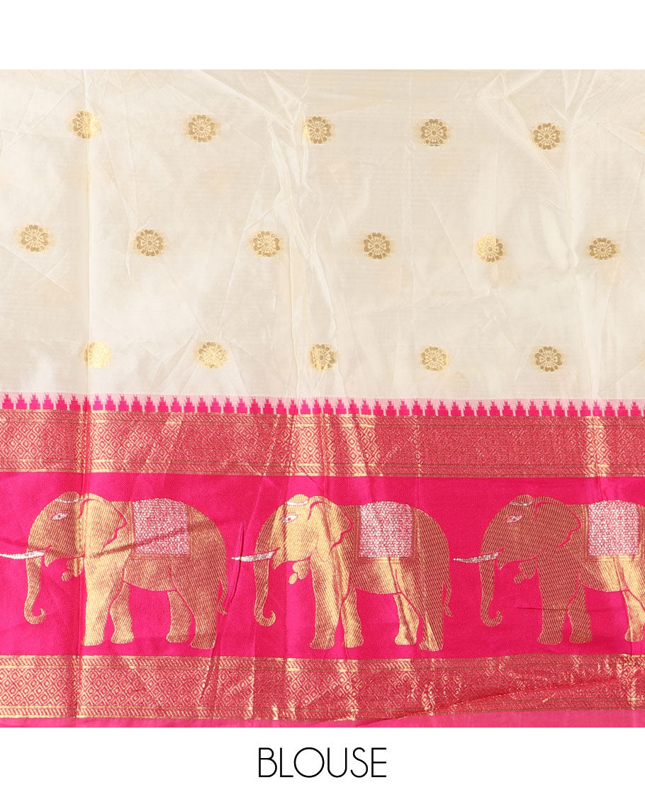 Cream-pink half-saree, zari buttas with contrast traditional zari elephant motifs bordered skirt, matching blouse and a contrast zari border dhavani