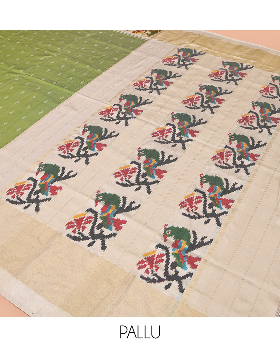 Green Pochampally Ikat Silk Saree, Steeped with Ikkat Buttas on Its Body, Complemented by a Contrast Temple Border of Paithani-Style Floral-Peacock Designs, Pallu of Same Design, and Paired with a Contrast Blouse