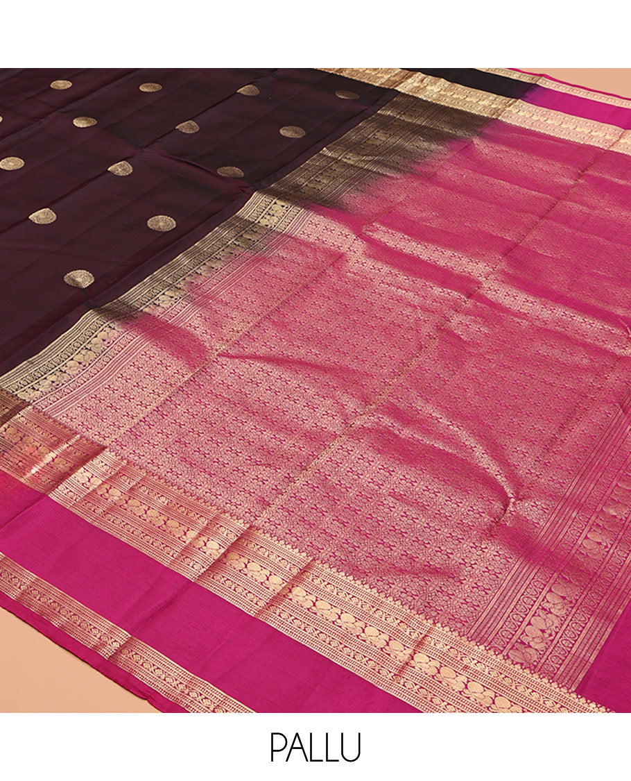 Maroon Vasundhara Silk Saree, Spotlighted with Chakram Buttas, a Rettai Pettu Border of Muthu, Kodi Visiry, and Mayil Designs, Contrast Grand Pallu, and a Contrast Blouse