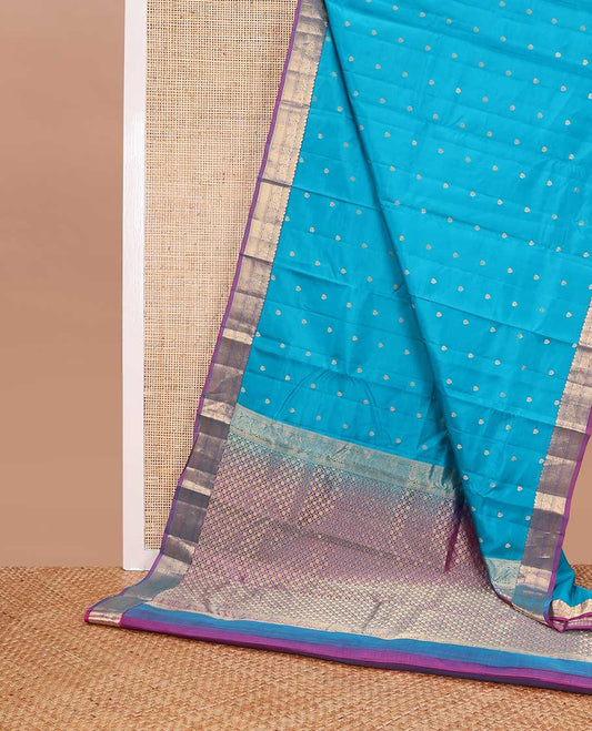 Light blue floral buttas vasundhara elite silk saree with contrast intricate zari design border & checked design pallu