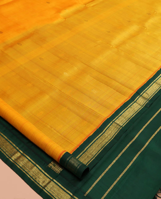 Orange Kanchipuram Silk Saree, Subtly Woven with Zari Buttas, a Contrast Korvai One-Sided Border of Banaras, and Jaal Designs, Zari Design Pallu, and No Blouse