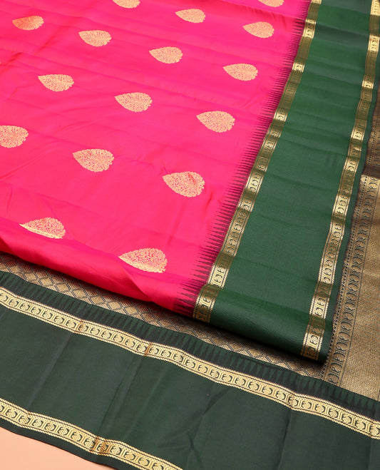 Pink Vasundhara Silk Saree, Woven with Zari Buttas, Complemented by a Contrast Thazampoo Rekku Rettai Pettu Border of Banaras and Manga Designs, Grand Jaal Pallu, and a Contrast Blouse