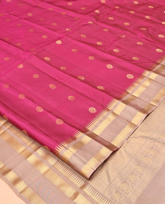Maroon Vasundhara Silk Mix Saree, Ornamented With Zari Buttas All Over Its Body, Complemented by Rettai Pettu Border of Rekku Designs, Vanki Design Pallu and Paired with a Contrast Blouse
