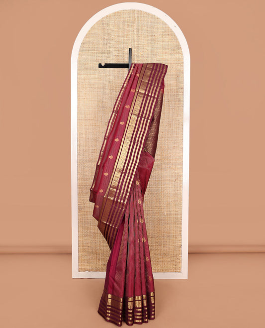 Apple red zari buttas and striped Vasundhara silk mix saree, contrast border of thilakam mokku, banaras, kathir, and kodi visiry designs, and jaal pallu