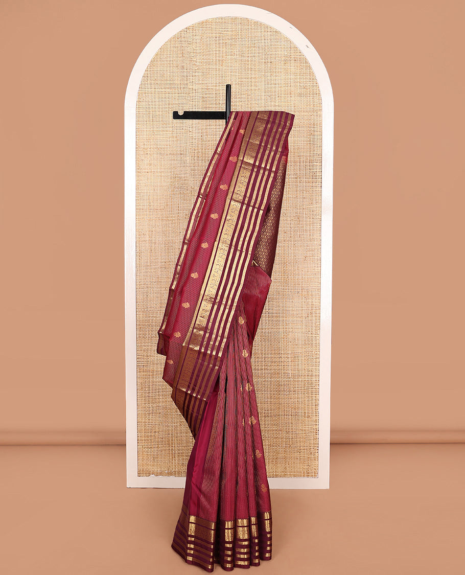 Apple red zari buttas and striped Vasundhara silk mix saree, contrast border of thilakam mokku, banaras, kathir, and kodi visiry designs, and jaal pallu