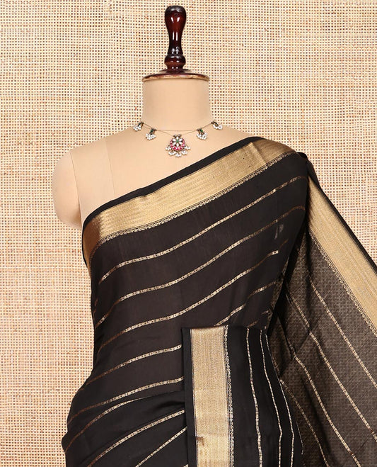 Black Assam Silk Saree, Subtly Enriched with Zari Stripes, Highlighted by a Zari Traditional Border, Zari-Striped Pallu, and a Matching Blouse