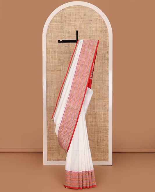 Cream zari buttas katan silk saree, contrast floral creeper design steeped border, and floral design weave pallu