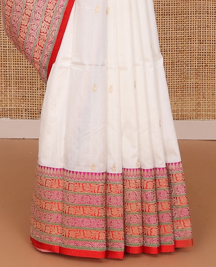 Cream zari buttas katan silk saree, contrast floral creeper design steeped border, and floral design weave pallu