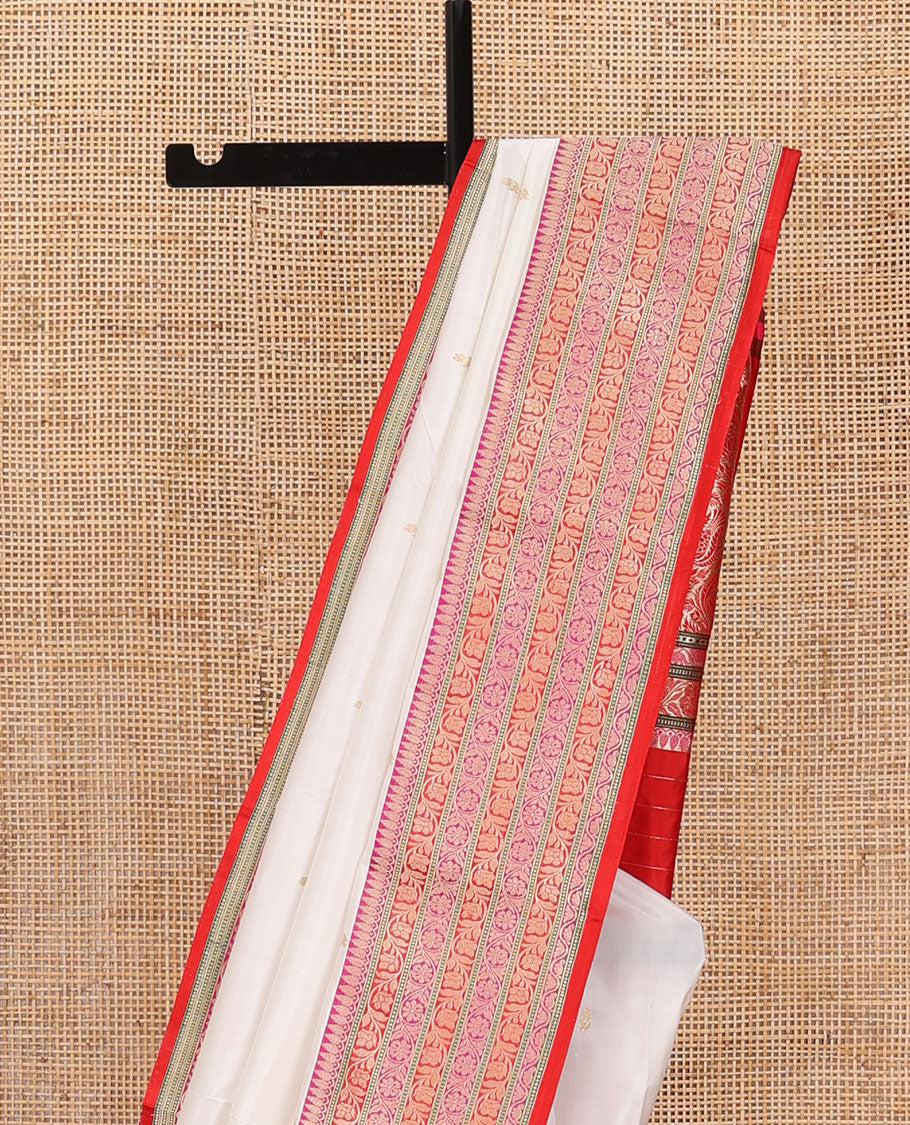 Cream zari buttas katan silk saree, contrast floral creeper design steeped border, and floral design weave pallu