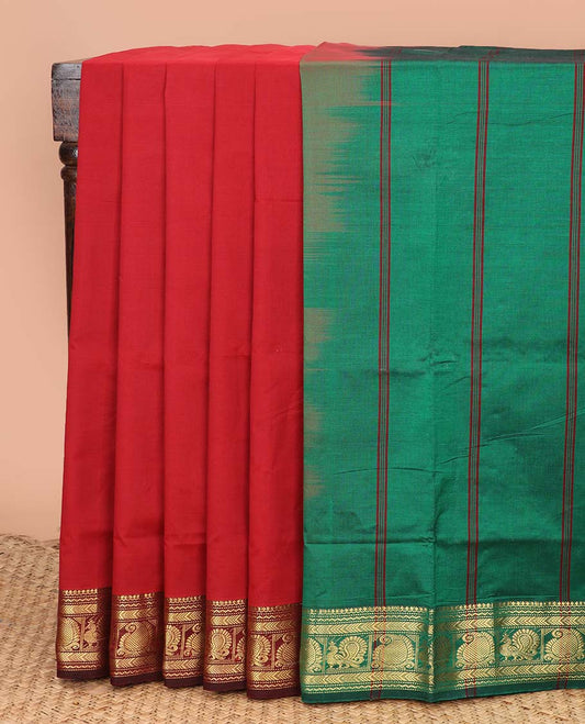 Red plain poly cotton saree, contrast traditional zari border, and contrast striped pallu