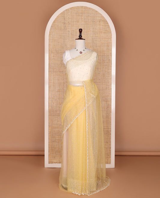 Pale yellow crystal stone & pearl beads embroidered designer saree with scallop embroidered border