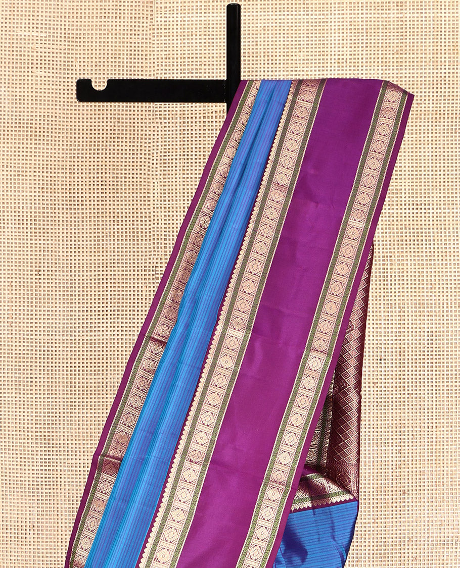 Blue Striped Kanchipuram Silk Saree, Complemented by Contrast Rettai Pettu Border, Pallu of Intricate Designs, and a Contrast Blouse