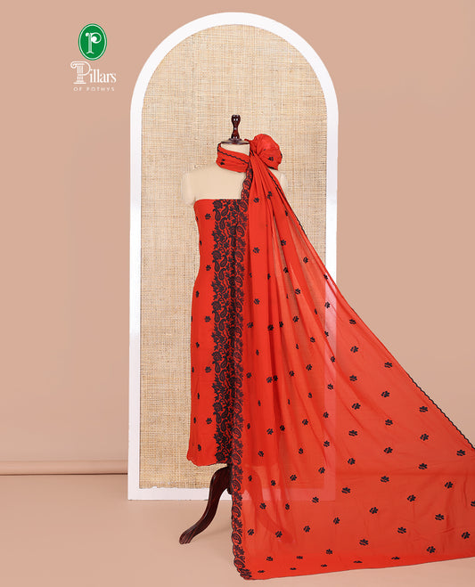 Rust-Black Georgette Material Churidar Features Floral-Paisley Embroidery Top, a American Crepe Bottom, a Scallop Embroidered Dupatta