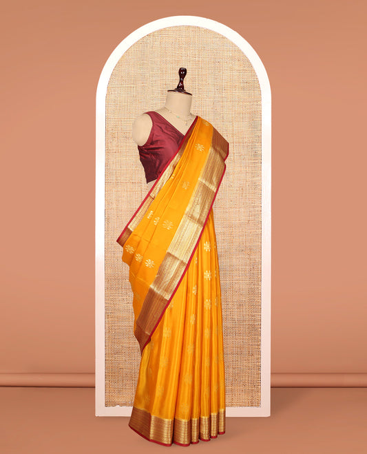 Yellow Mysore Silk Saree, Detailed with Zari Buttas, Complemented by a Contrast Traditional Zari Border, Jaal Pallu, and a Contrast Blouse