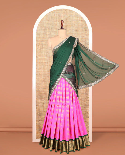 Pink Art Silk Material Half Saree Set, Beautified with Zari Buttas and Stripes on Its Skirt, Complemented by a Contrast Traditional Zari Design Border, Paired with a Contrast Blouse, and Scallop Embroidered Dhavani