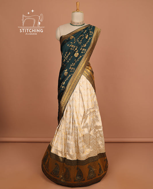 Cream geometric design half saree with contrast zari border, zari design blouse & green floral zari design dhavani