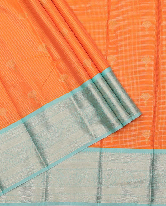 Orange Art Silk Pavadai Material Set, Beautifully Bedecked with Micro-Checks and Buttas on Its Skirt, Complemented by a Contrast Traditional Zari Design Border, and Paired with a Contrast Blouse