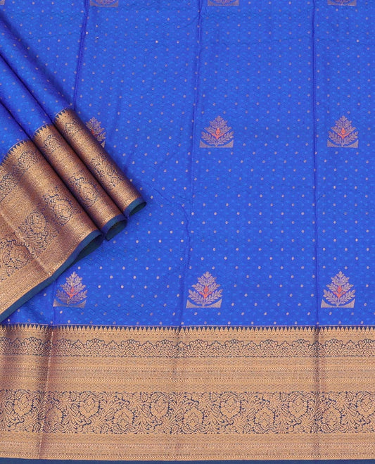 Blue Art Silk Pavadai Material Set Adorned with Zari Buttas and Embossed All Over the Skirt, Complemented by a Contrast Traditional Zari Design Woven Border, and Paired with a Contrast Blouse