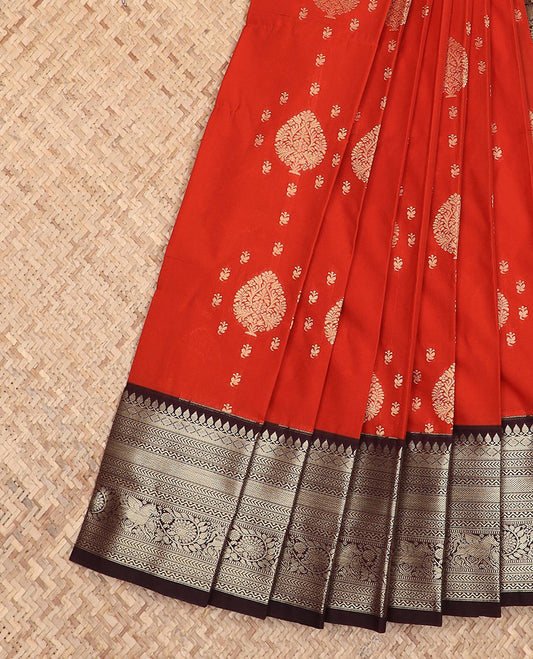 Dark orange zari design gift saree, contrast traditional zari design border, and intricate pallu