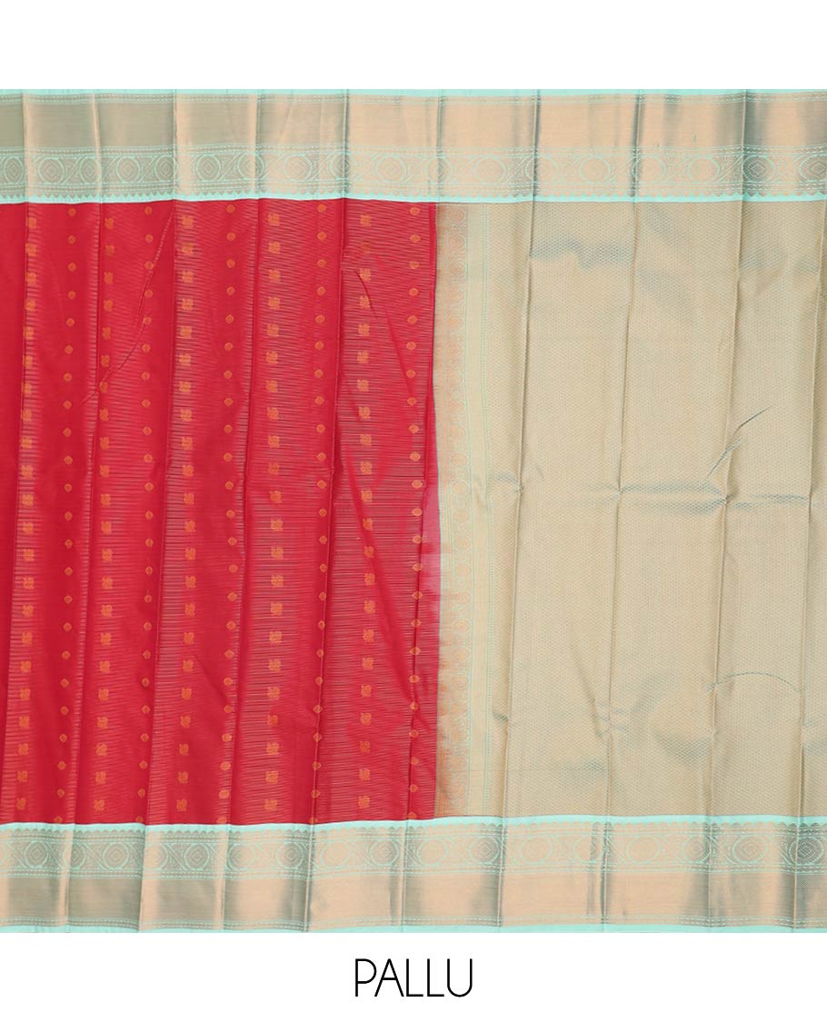 Red peacock chakram buttas and striped gift saree, contrast traditional zari border, and intricate pallu