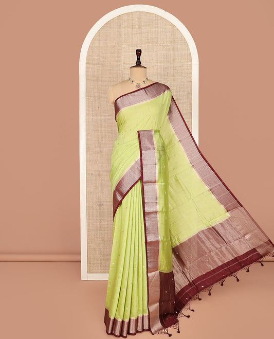 Green Assam Silk Saree Sparsely Sparkled with Zari Butta Enclosed Checks on Its Body, Complemented by a Contrast Traditional Zari Design Woven Border, Scintillating Pallu, and Paired with a Contrast Blouse
