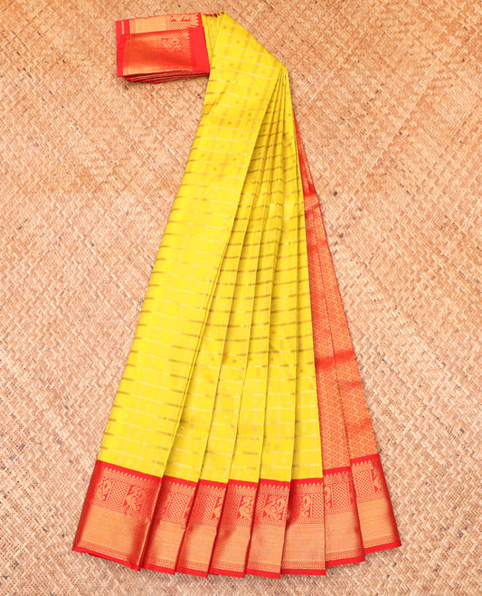 Yellow Budget Silk Saree, Subtly Sparkled With Zari Buttas and Stripes All Over Its Body, Complemented by Contrast Traditional Zari Designs Woven Border, Grand Jaal Pallu and Paired with a Contrast Blouse
