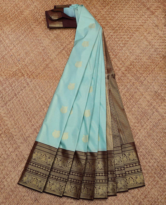 Blue Budget Silk Saree, Sparsely Sparked with Zari Buttas and Stripes All Over Its Body, Complemented by Contrast Traditional Zari Designs Woven Border, Grand Pallu and Paired with a Contrast Blouse