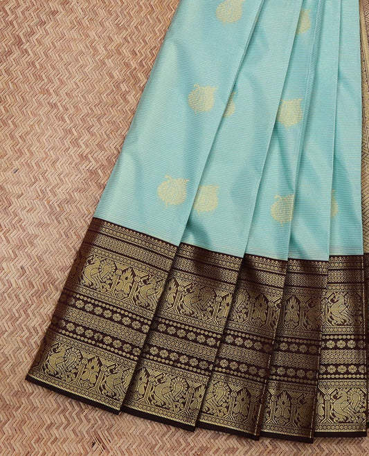 Blue Budget Silk Saree, Sparsely Sparked with Zari Buttas and Stripes All Over Its Body, Complemented by Contrast Traditional Zari Designs Woven Border, Grand Pallu and Paired with a Contrast Blouse