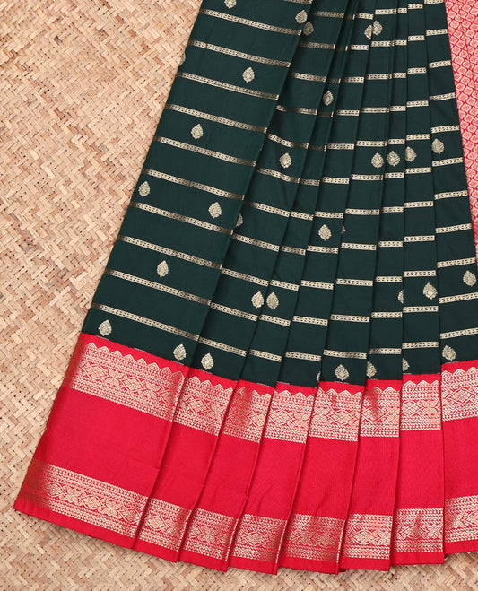 Green Budget Silk Saree, Embellished with Zari Buttas and Stripes All Over Its Body, Complemented by a Contrast Traditional Zari Design Rettai Pettu Border, Grand Jaal Pallu, and Paired with a Contrast Blouse