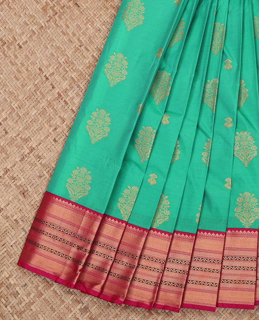 Green Budget Silk Saree, Elevated with Zari Buttas All Over Its Body, Complemented by a Contrast Traditional Zari Design Border, Grand Pallu, and Paired with a Contrast Blouse