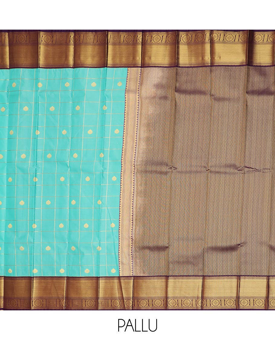 Turquoise Budget Silk Saree Enthralled with Zari Buttas Enclosed Checks, Complemented by a Contrast Traditional Design Border, Vibrant Jaal Design Pallu, and a Contrast Blouse