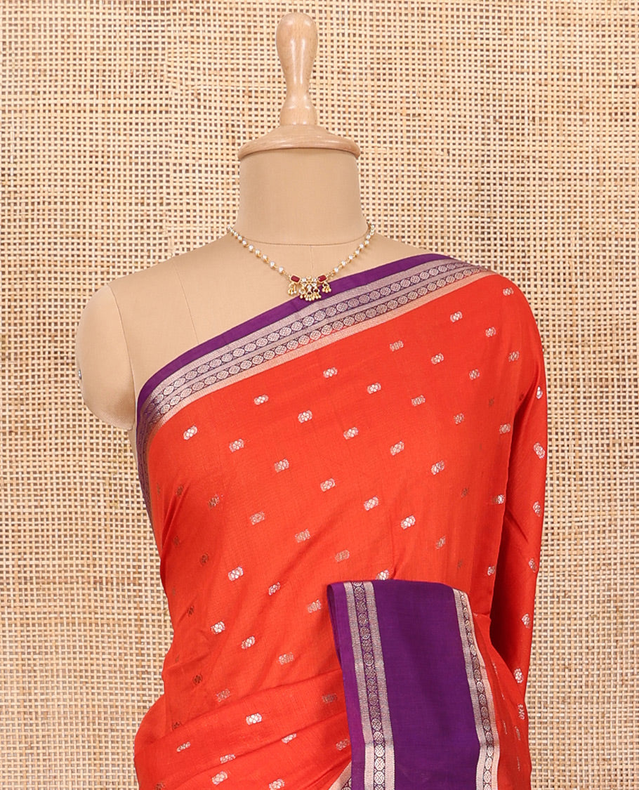 Dark Orange Assam Silk Saree Accentuated with All-Over Buttas, Complemented with a Contrast Traditional Design Border, Zari-Elevated Pallu, and Paired with a Contrast Blouse