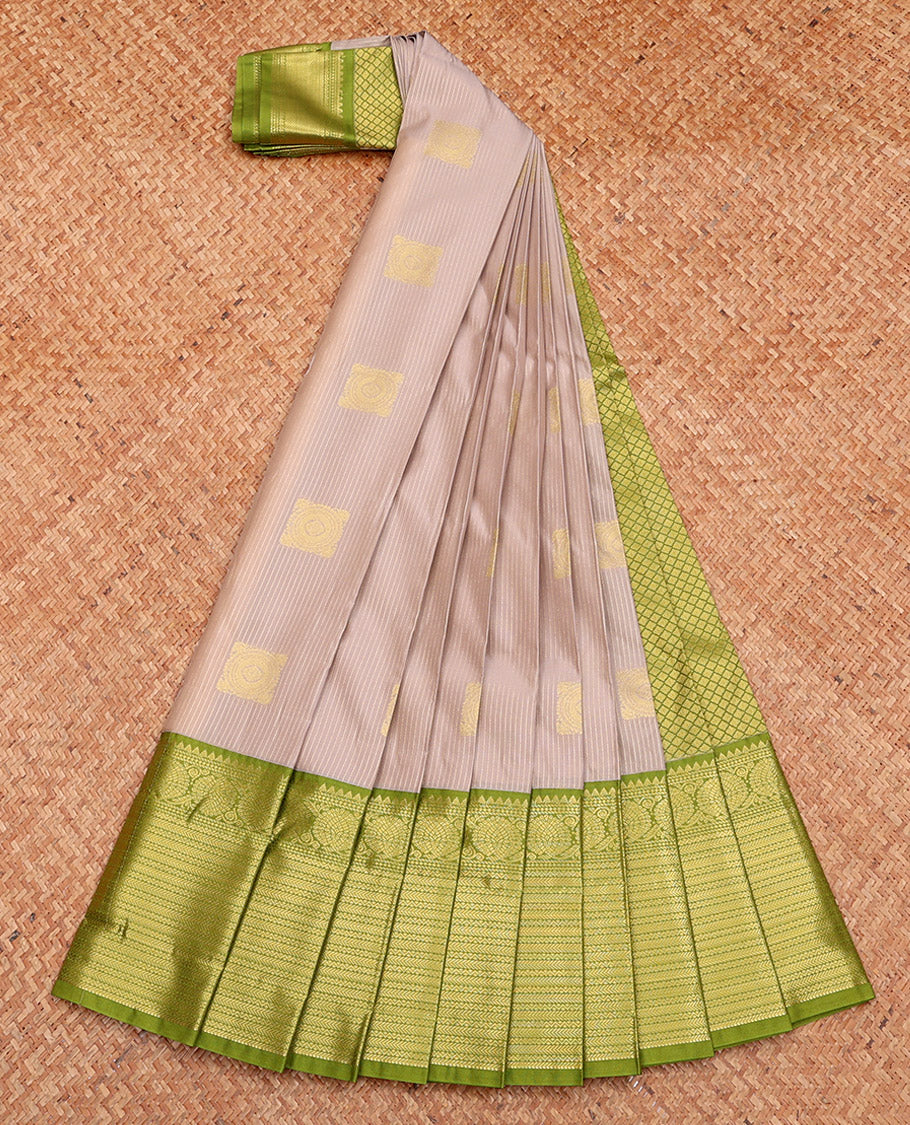 Grey Budget Silk Saree, Sparsely Threaded with Zari Buttas and Stripes, Complemented by a Contrast Traditional Zari Border, Jaal Pallu, and Contrast Blouse