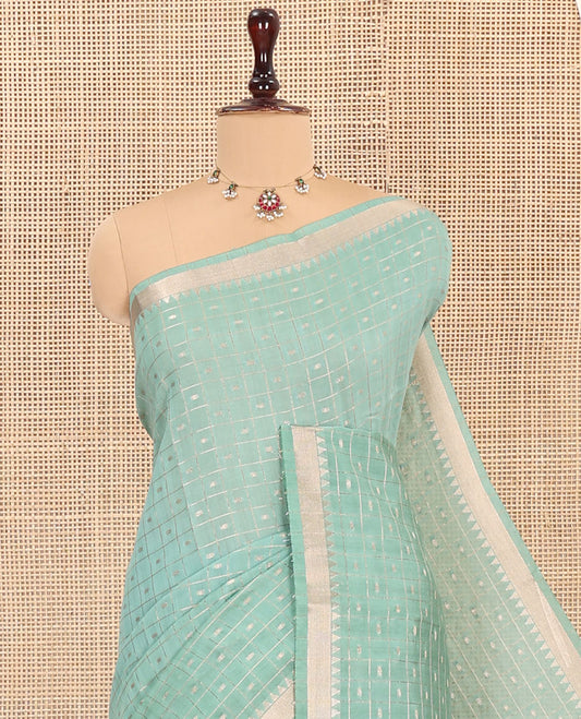 Green Assam Silk Saree, Elegantly Highlighted with Zari Butta Enclosed Checked Design, Highlighted by Zari Temple Border, Pallu Steeped with Zari Designs, and Paired with a Contrast Blouse