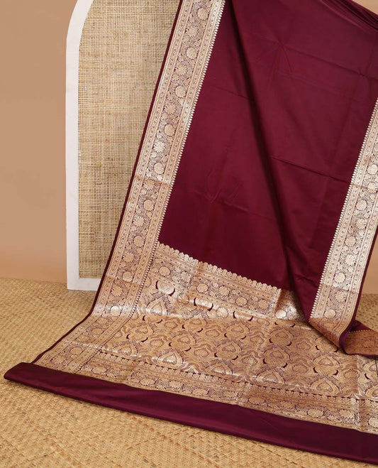 Maroon semi banaras nylon saree with self floral design border & floral ogee design pallu
