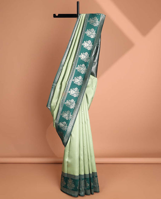 Mint green floral motifs litchi silk saree with contrast floral design border & floral jaal design pallu
