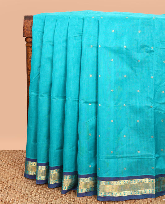 Blue Venkatagiri Cotton Saree, Enthralled with Buttas on Its Body, Complemented by a Contrast Traditional Zari Border, Gleaming Zari-Striped Pallu, and Comes Without a Blouse
