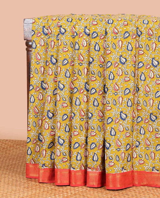Mustard floral vine design machine-printed kalamkari cotton saree with contrast border of zari design & animal motif pallu