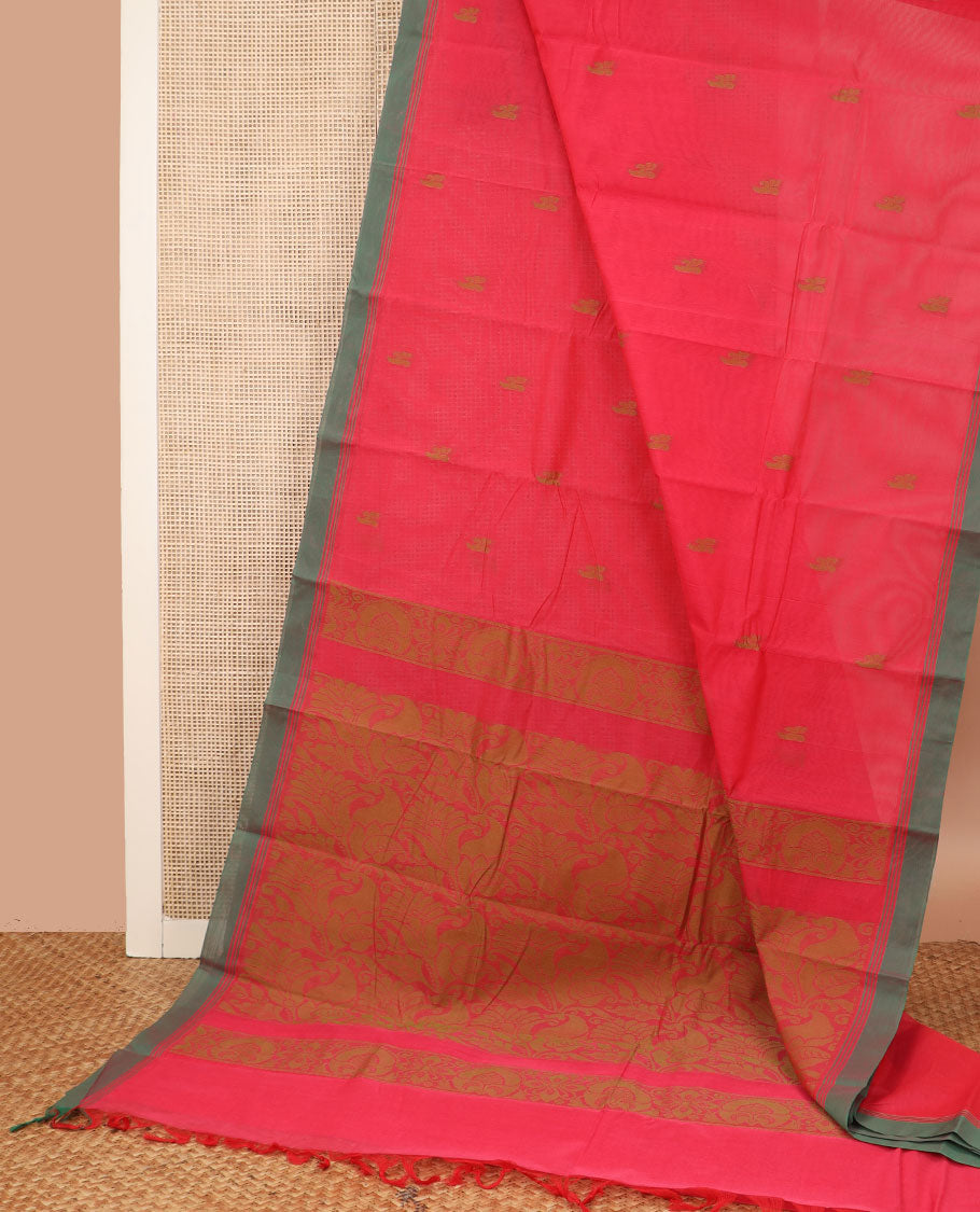Pink buttas Kanchi cotton saree, contrast plain border, and pallu of floral designs
