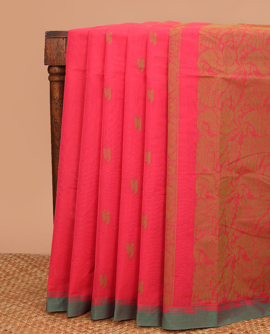 Pink buttas Kanchi cotton saree, contrast plain border, and pallu of floral designs