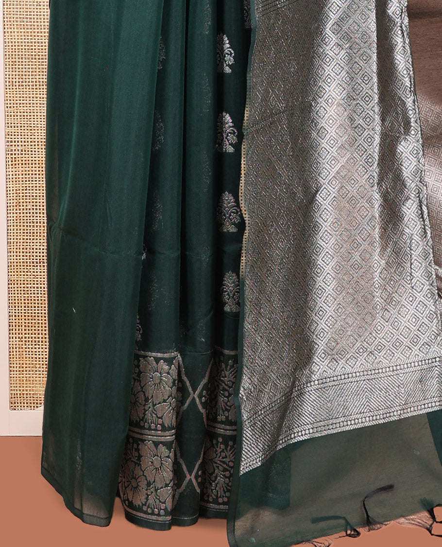 Green Semi-Silk Cotton Saree, Decked Up with Zari Buttas All Over Its Body, Highlighted by a Zari Border of Floral Designs, Gleaming Jaal Pallu, and Paired with a Matching Blouse