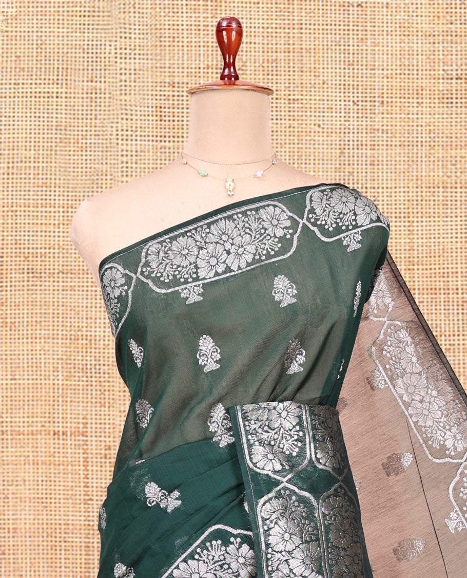 Green Semi-Silk Cotton Saree, Decked Up with Zari Buttas All Over Its Body, Highlighted by a Zari Border of Floral Designs, Gleaming Jaal Pallu, and Paired with a Matching Blouse