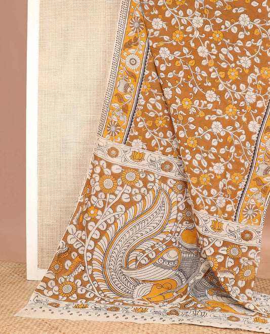 Mustard floral vine machine printed kalamkari cotton saree, contrast floral-pot motifs printed border, and pallu of peacock print